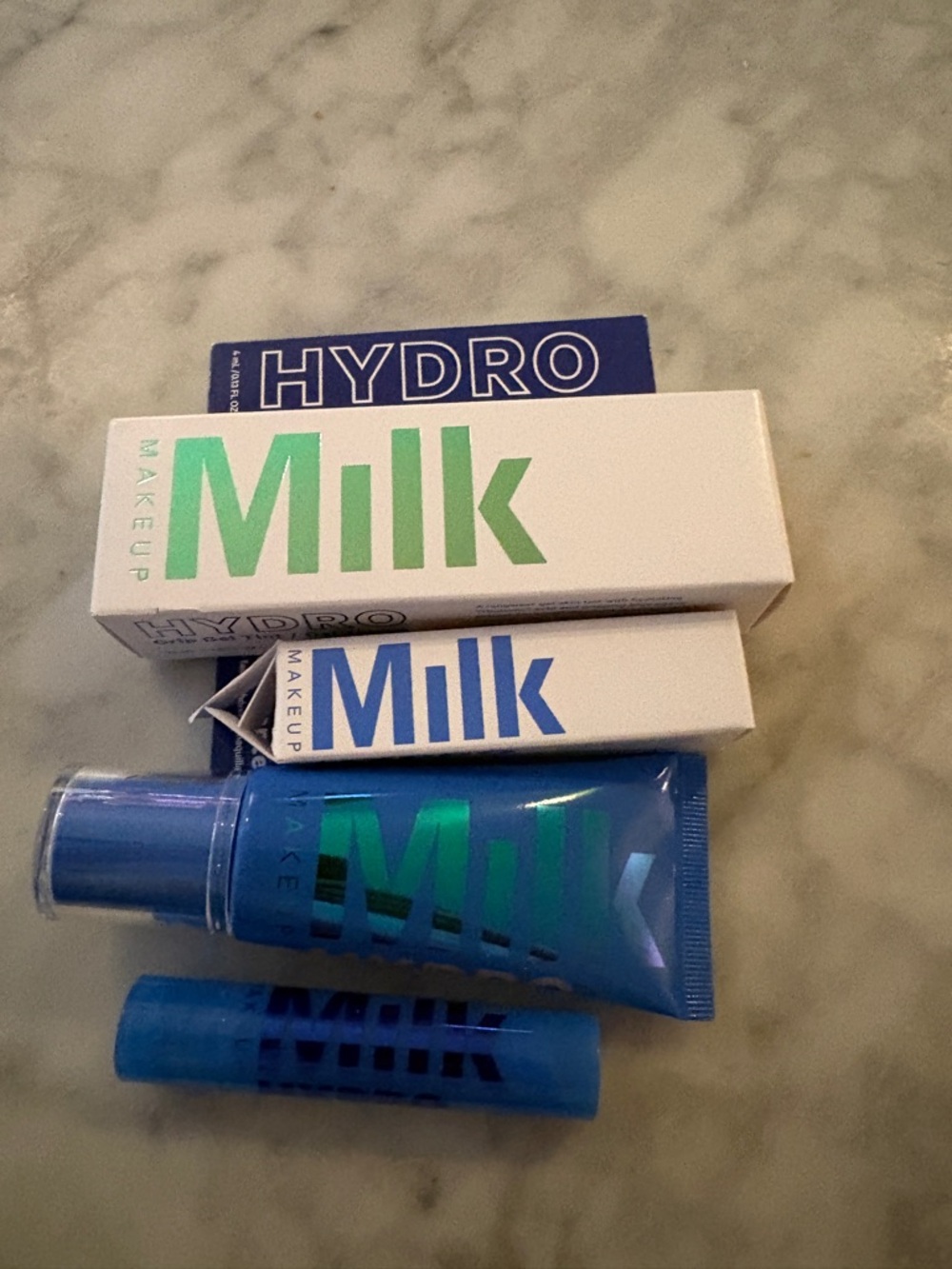 Milk Makeup Hydro Gel Tint.      Milk Makeup Hydro Grip Gel Concealer.